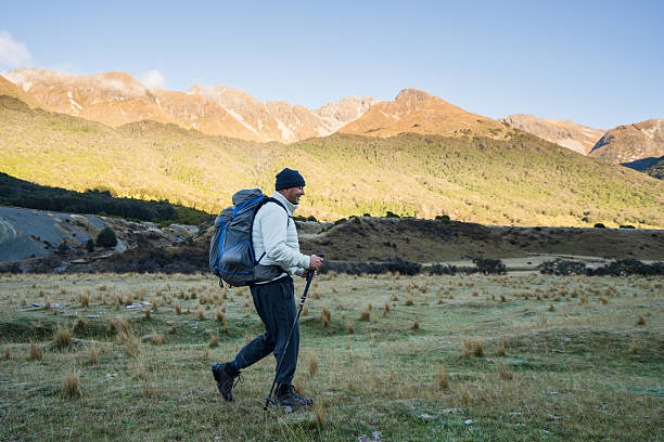 istock Male with backpack hiking in harmony. 2213968636