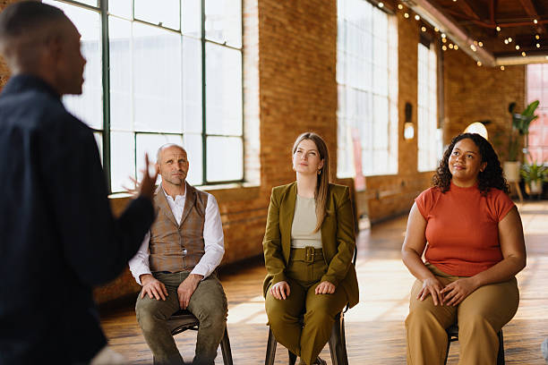 istock Business coach leading a workshop with his team in a modern office 2213968659