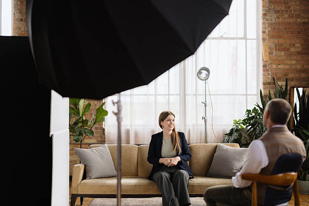 istock Businesswoman being interviewed by journalist in a loft studio 2213970419