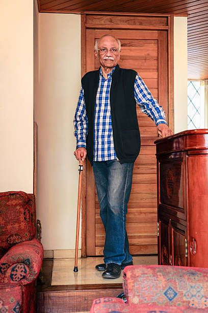 istock Senior Indian Man With Walking Cane 2213973485