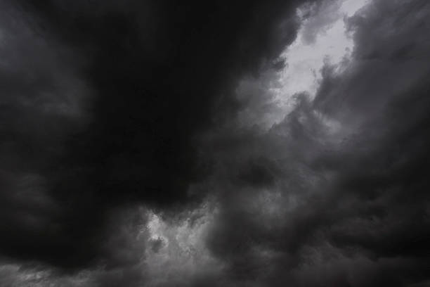 istock Dramatic dark storm rain clouds black sky background. Dark thunderstorm clouds rainny atmosphere. Meteorology danger windstorm disasters climate. Dark cloudscape storm disaster gloomy gray cloud sky 2213979495