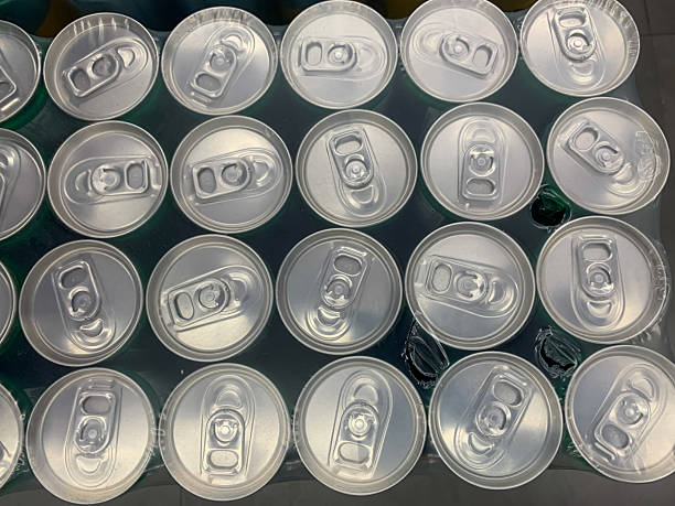 istock Row of Soda Can Tops in Plastic Packaging 2213980954