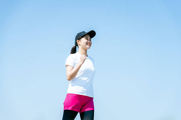istock young woman walking 2213981165