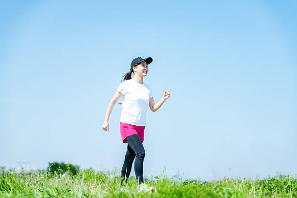 istock young woman walking 2213981168