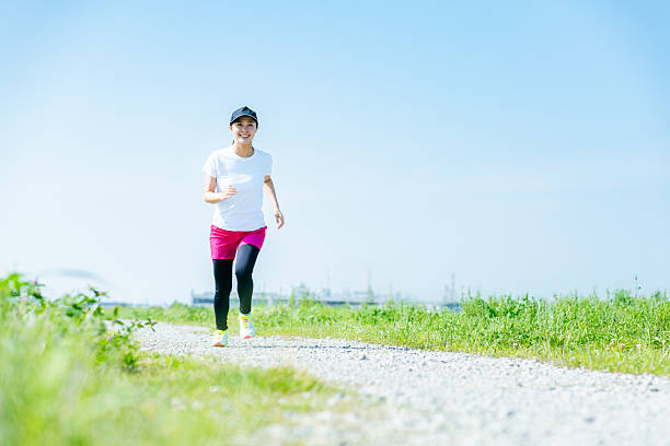 istock young woman running 2213981169