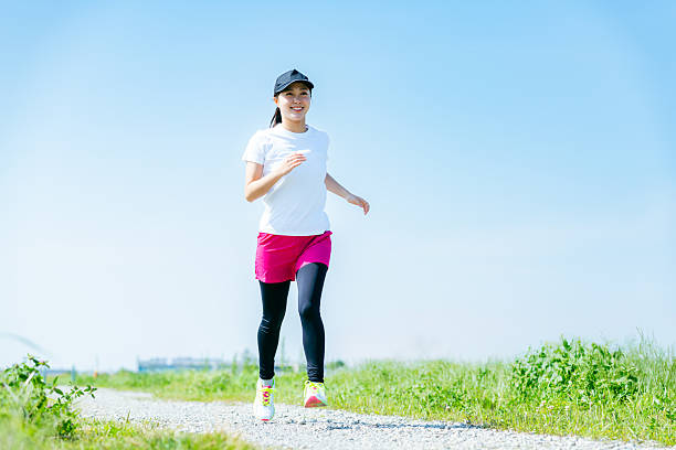 istock young woman running 2213981172
