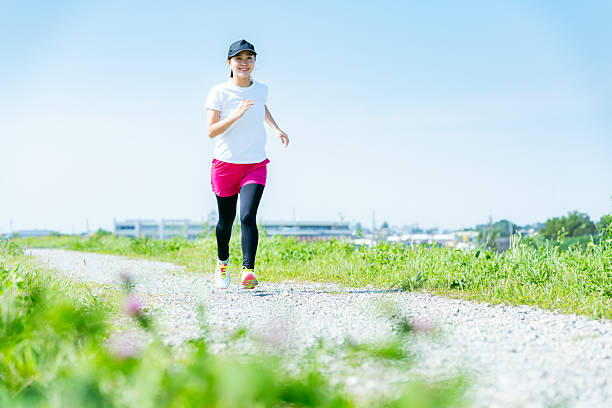 istock young woman running 2213981179