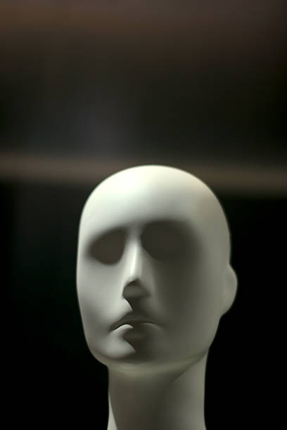 istock Mannequin's head in dark background. 2213983243
