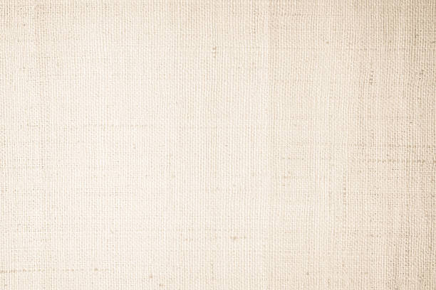 istock Brown sackcloth woven texture background in natural pattern. Jute hessian burlap, linen background in light beige cream color blank. Weaving canvas fiber line cotton cloth textured as organic. 2213985198