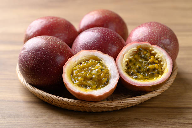 istock Fresh passion fruit in basket on wooden background, Tropical fruit 2213991374
