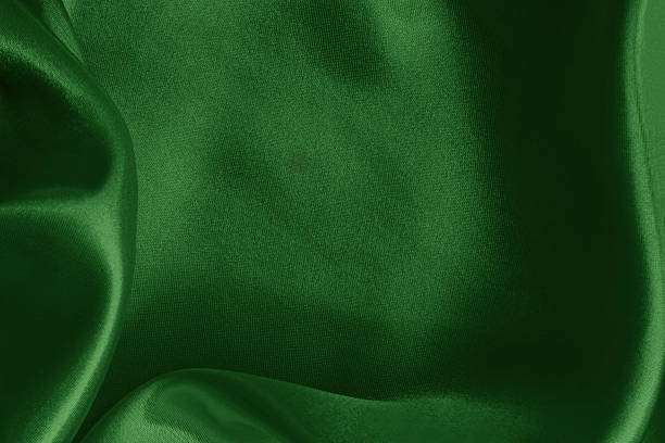 istock Dark green fabric cloth texture for background and design art work, beautiful crumpled pattern of silk or linen. 2213991859