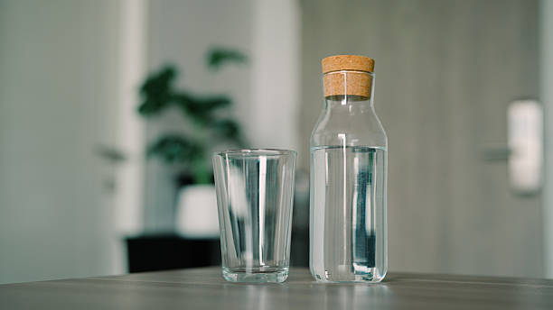Bottle ,  glass , water at home