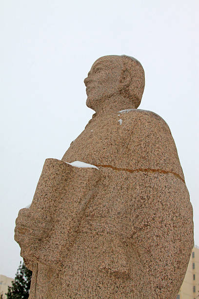istock Chinese ancient figure sculpture in a park 2214000433