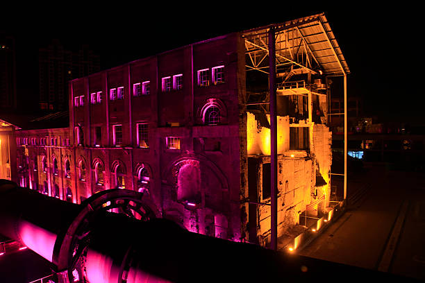 istock idle cement plant rotary kiln machinery at night 2214000538