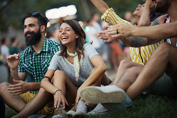 istock Group of friends chilling before a concert. 2214000752