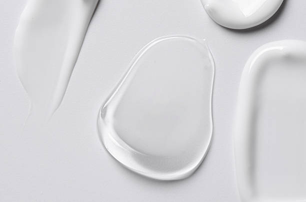 istock A sample of white and transparent cosmetic cream 2214002236
