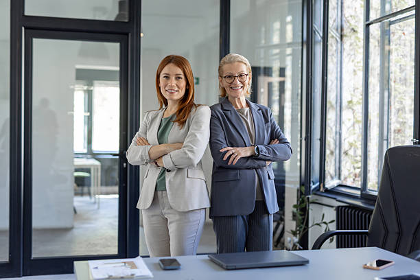 istock Professional women empowering each other in office space. 2214002587