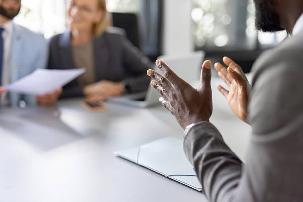 Business Professionals Shaking Hands Over Agreement