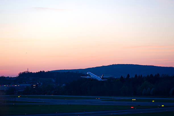 Passenger airplane LOT Embraer E195-E2 registration SP-LEB taking off from Swiss Airport Zürich Kloten on a spring sunset. Photo taken April 8th, 2025, Zurich Kloten, Switzerland.