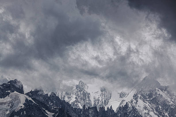 istock Mountain landscape - Mont blanc massif under dramatic stormy clouds with snow-capped peaks 2214005391