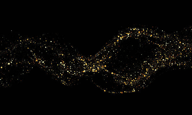 istock Gold glitter wave of glowing particles on black background 2214006329