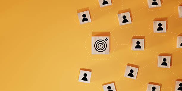 istock Red dartboard and red arrow connection linkage with human icon for customer focus target group and customer relation management concept. 2214006382