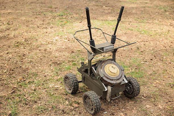 istock Armed military ground drone in firing field 2214007574