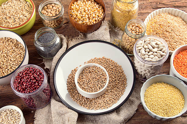 istock Ancient grains, seeds, beans in plates. 2214008559