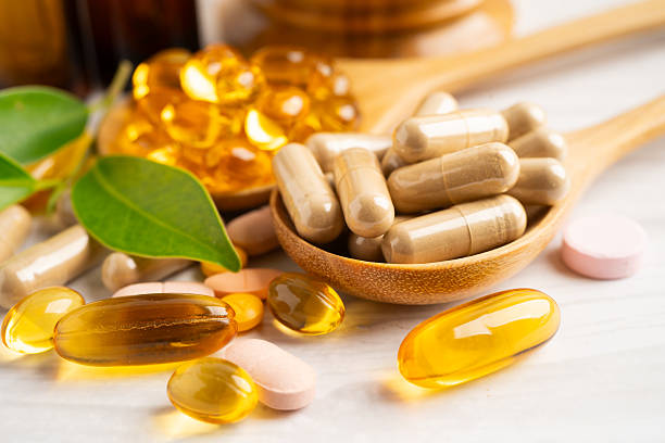 istock Alternative medicine herbal organic capsule drug herb. 2214011464