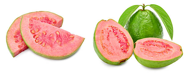 istock sliced guava isolated on white background. clipping path 2214012512
