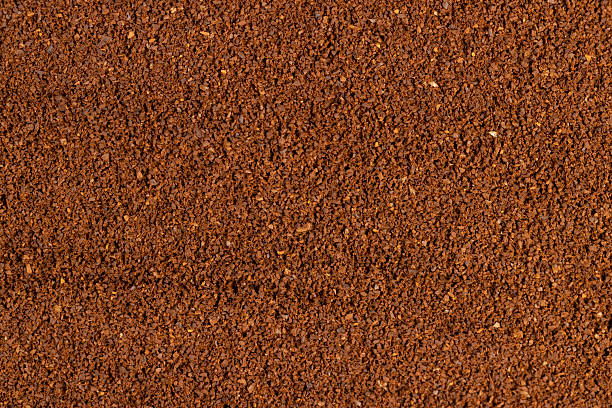istock ground coffee roasted before grinding, an abstract uneven background of ground coffee beans for making a high-quality and aromatic coffee drink 2214013116