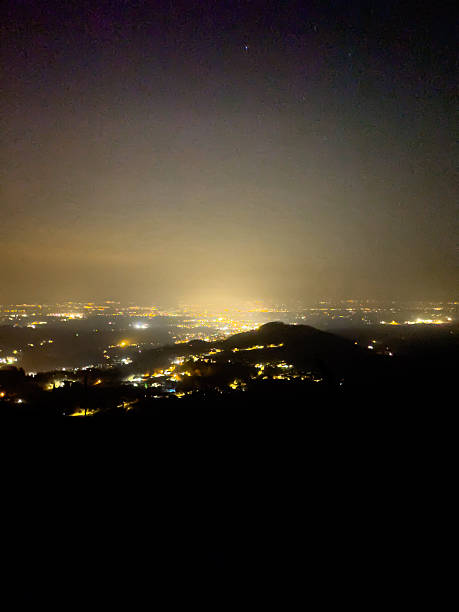 istock City Lights at Night from a Mountain Viewpoint. 2214013968