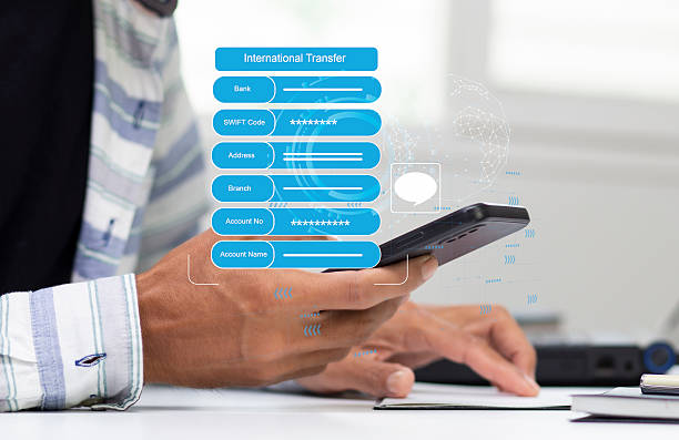 istock man using smartphone and provide customer the payment detail international transfer 2214016254