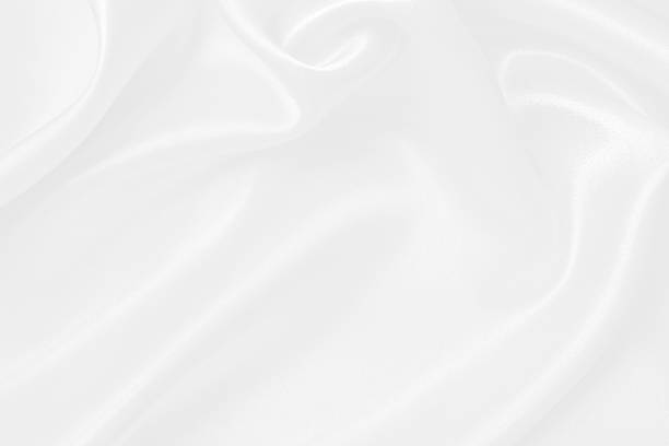 istock White fabric texture background, detail of silk or linen pattern. 2214017406