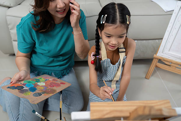istock Activity painting together as mother and daughter explore creativity 2214018073