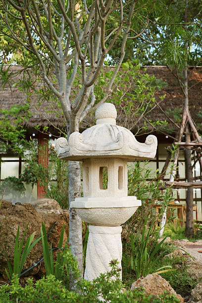 istock Japanese Style Stone Lantern Called Toro in the Garden 2214018436