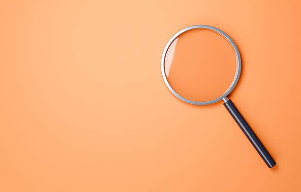 istock 3D illustration of a magnifying glass 2214019455