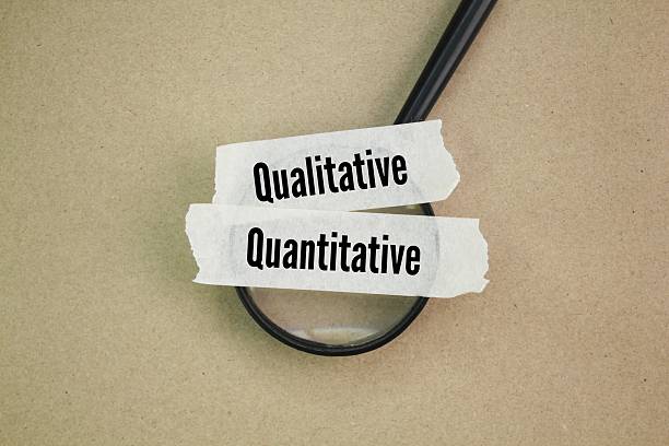 istock magnifying glass and sticker with the words quantitative and qualitative 2214019972