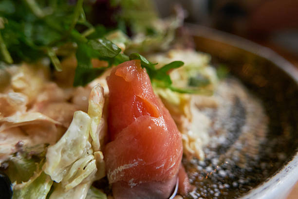 making a salad with fresh tuna