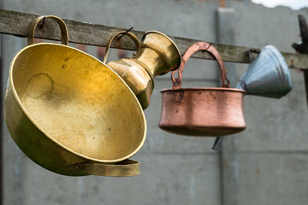 Vintage bronze and copper stuff sold on a market near the road, Romania