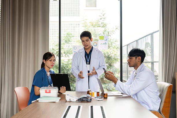 istock Doctor team collaborating on patient care and medical data 2214031806