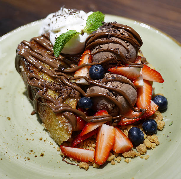 istock Berry bread pudding served with rich chocolate ice cream 2214032073