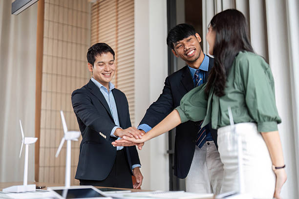 istock ESG and Sustainability: Professionals making a pact in a collaborative meeting 2214032812