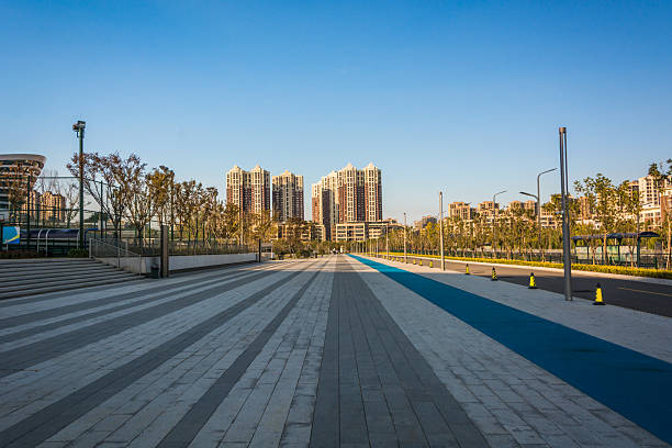 Serene Urban Landscape: Modern Architecture and Open Spaces Under the Clear Sky