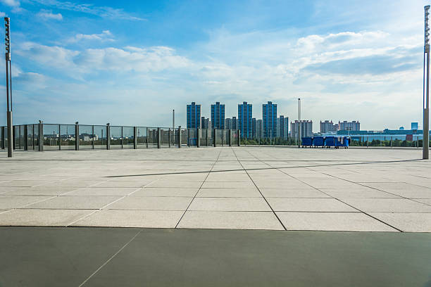 istock Contemporary Urban Landscape Featuring Modern Skyscrapers and Expansive Pavement 2214037292