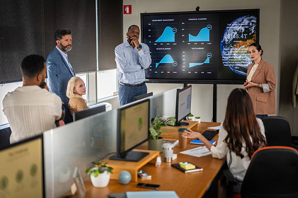 istock Diverse Business Team Collaborating on Marketing Strategy in Modern Office 2214037408