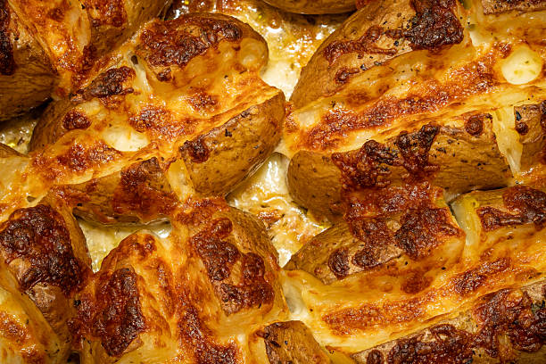 istock Roasted Potatoes with Butter and Mozzarella Cheese 2214038803