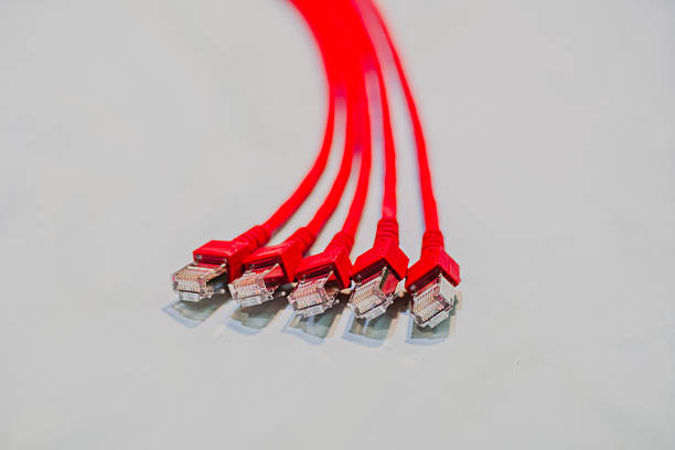 red ethernet cable network with red RJ45 connector, symbolizing high-speed internet, fiber optic network, LAN cables, data transfer cable, digital communication, internet cable, connect cable