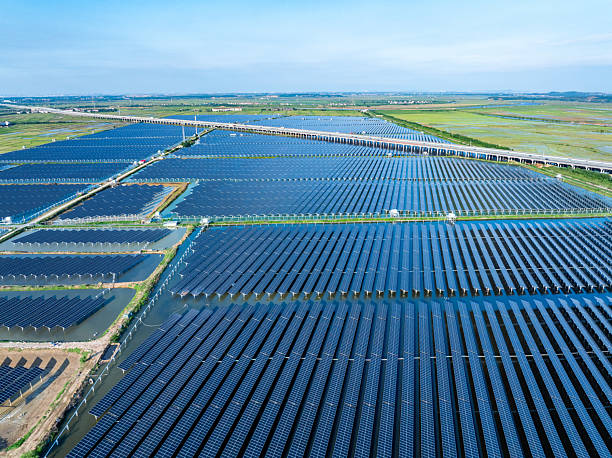 istock Solar panels at sunset，solar power plant 2214042185