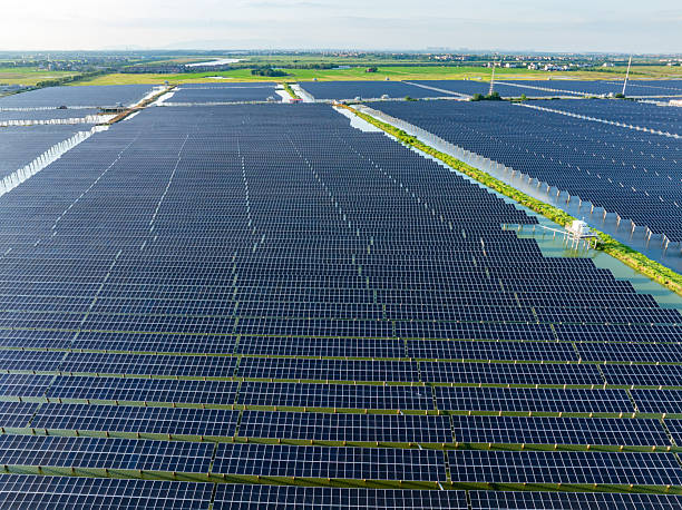 istock Solar panels at sunset，solar power plant 2214042849